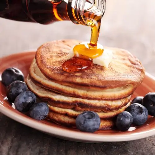 Date Liquid Sugar drizzled on pancakes as a natural sweetener alternative